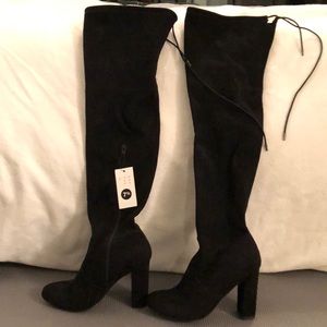 Over the knees tie boots